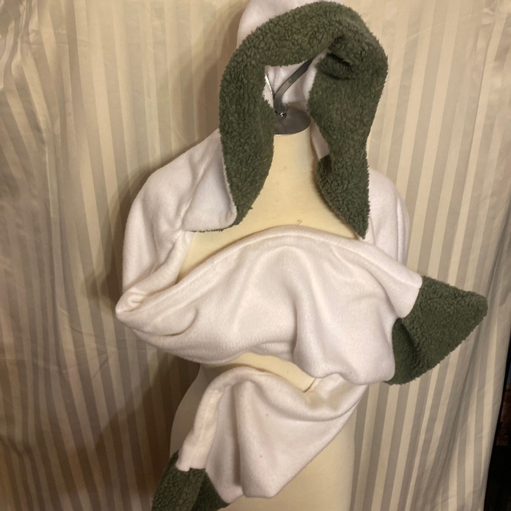 Hooded wrap with 30 inch long wrap. Handcrafted bought at a craft show. New